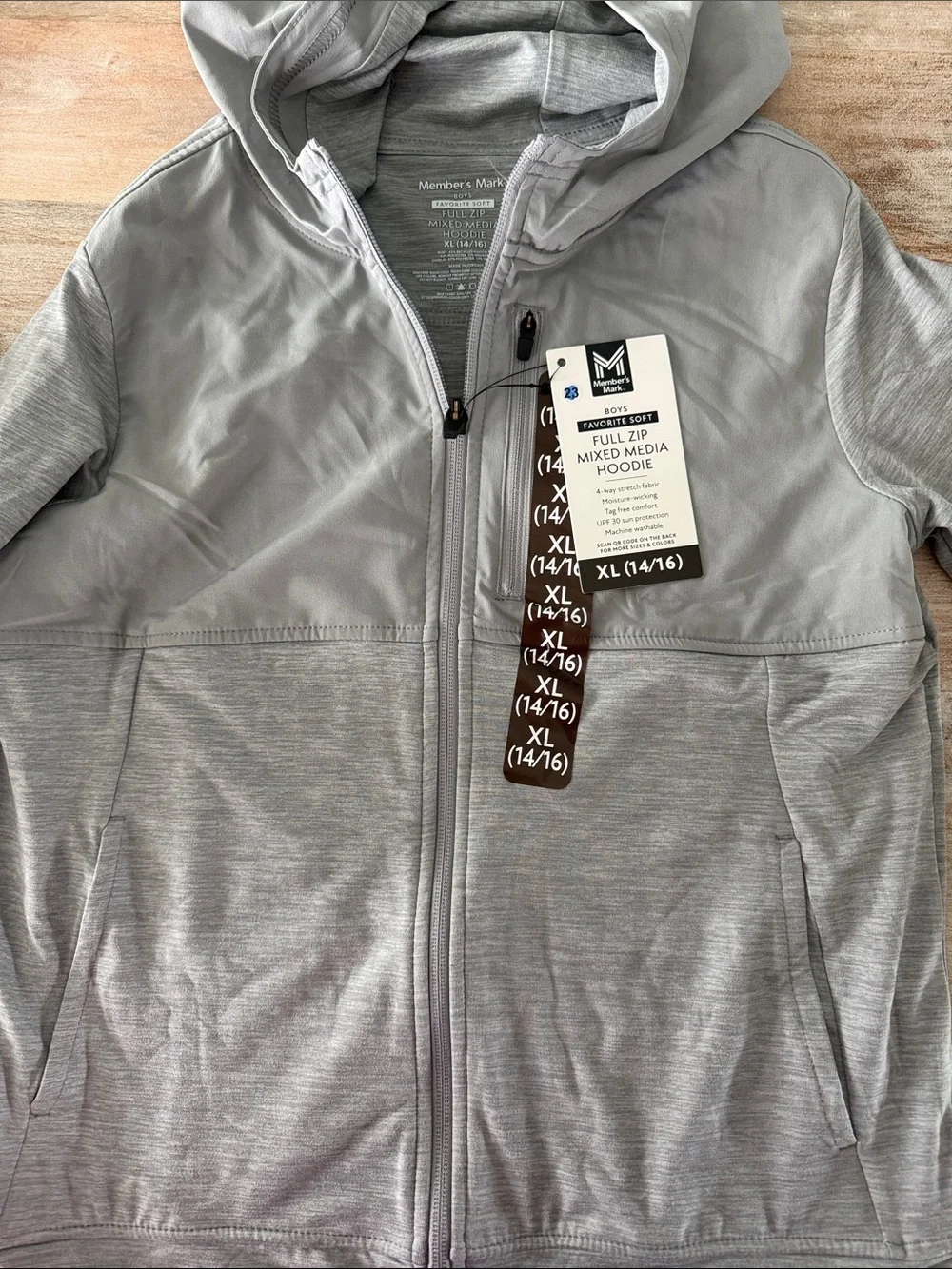 Gray full zip hoodie.